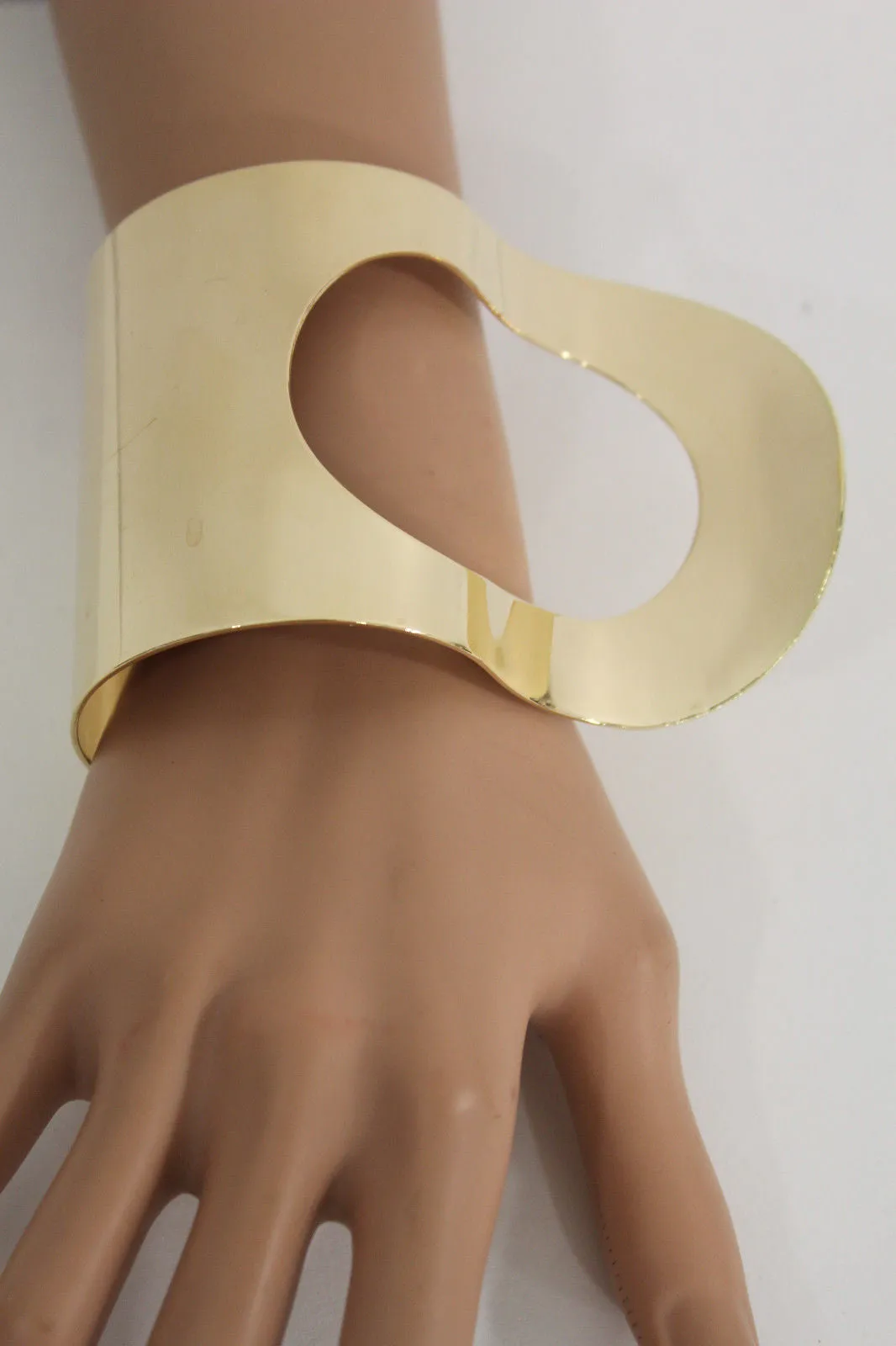 Retro Wave Hole Shapes Women Gold Metal Hand Cuff Bracelet