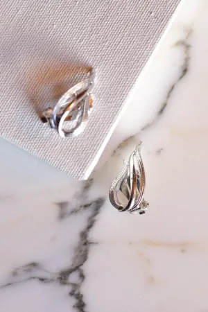 Sarah Coventry Silver Flame Earrings
